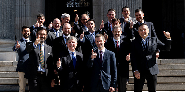 People at Company bell ringing at the Madrid Stock Exchange Palace